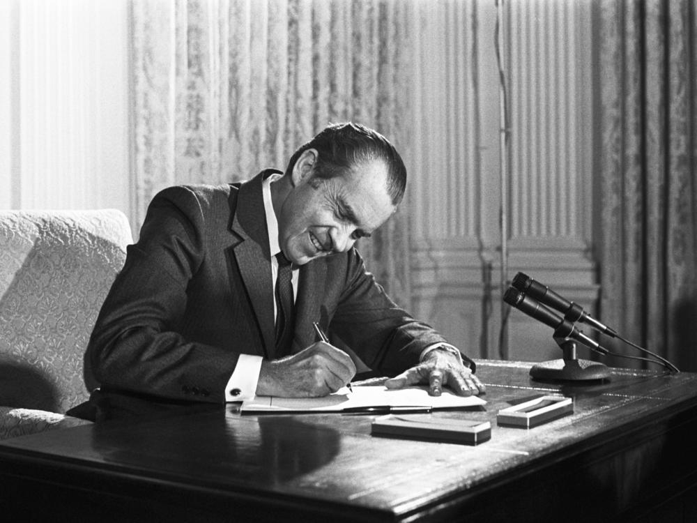 Richard Nixon signs the National Cancer Act at the White House on Dec. 23, 1972. It provided $1.6 billion to find the causes of cancer and find new treatments.
