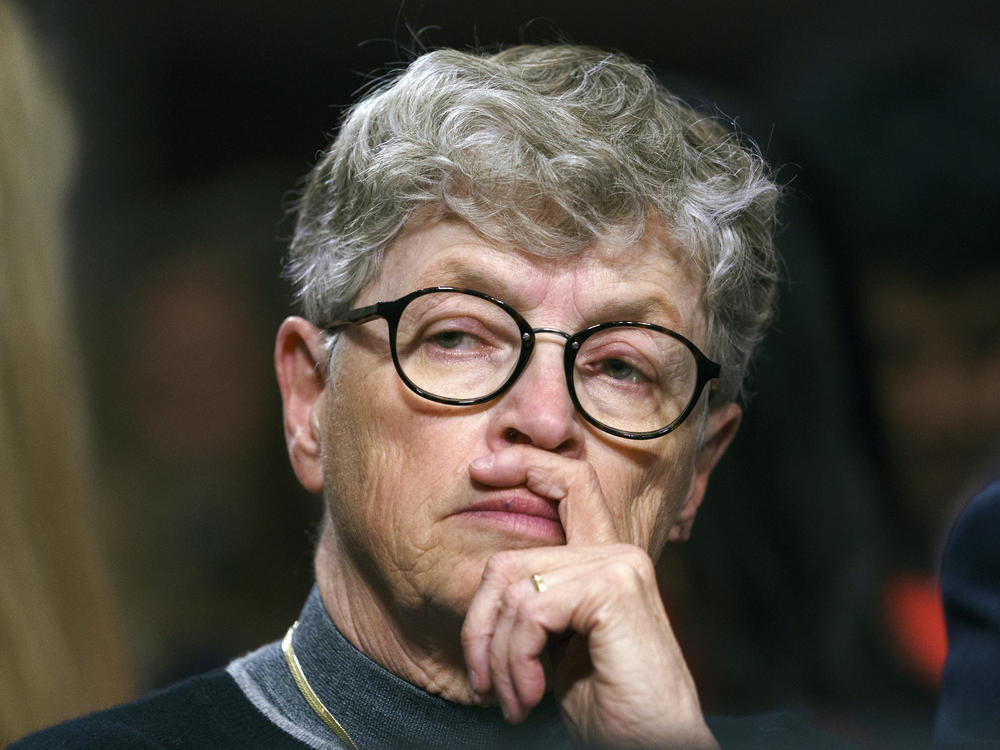 Former Michigan State President Lou Anna Simon pauses before testifying during a 2018 Senate subcommittee hearing in Washington, D.C., on preventing abuse in Olympic and amateur athletics.