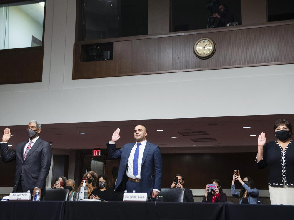 From left: Julien Xavier Neals, nominee to be U.S. district judge for the District of New Jersey; Zahid Quraishi, nominee to be judge for the District of New Jersey; and Regina Rodriguez, nominee to be judge for the District of Colorado are sworn in during an April 28 Senate Judiciary Committee hearing. Quraishi has become the first Muslim American federal judge.