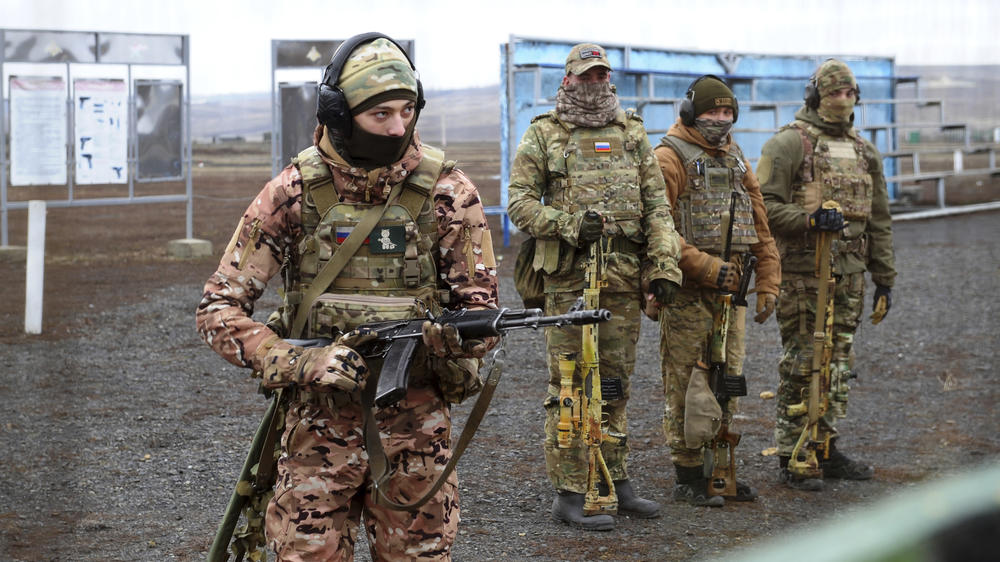 Russian troops take part in drills in southern Russia, near the border with Ukraine, on Dec. 14. Some 100,000 Russian troops are in the border area, raising concern about another Russian invasion into Ukraine. Russian forces seized the Crimean Peninsula from Ukraine in 2014 and remain there to this day.