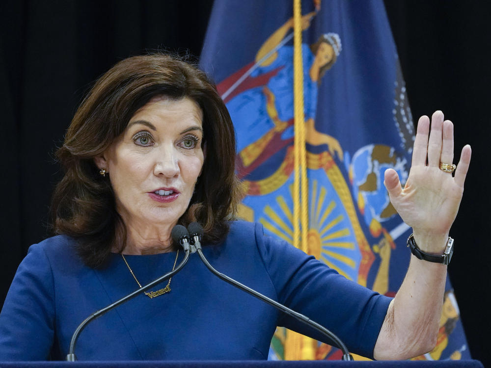 New York Gov. Kathy Hochul shortened the quarantine period for many essential workers even as infections have surged because of the omicron variant.