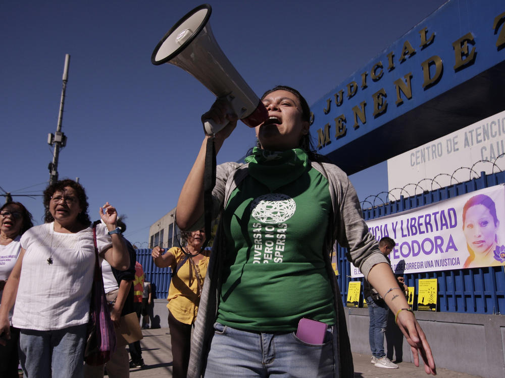 Protesters in San Salvador, on Dec. 13, 2017, demand El Salvador's government free women prisoners serving 30-year sentences for having an abortion.