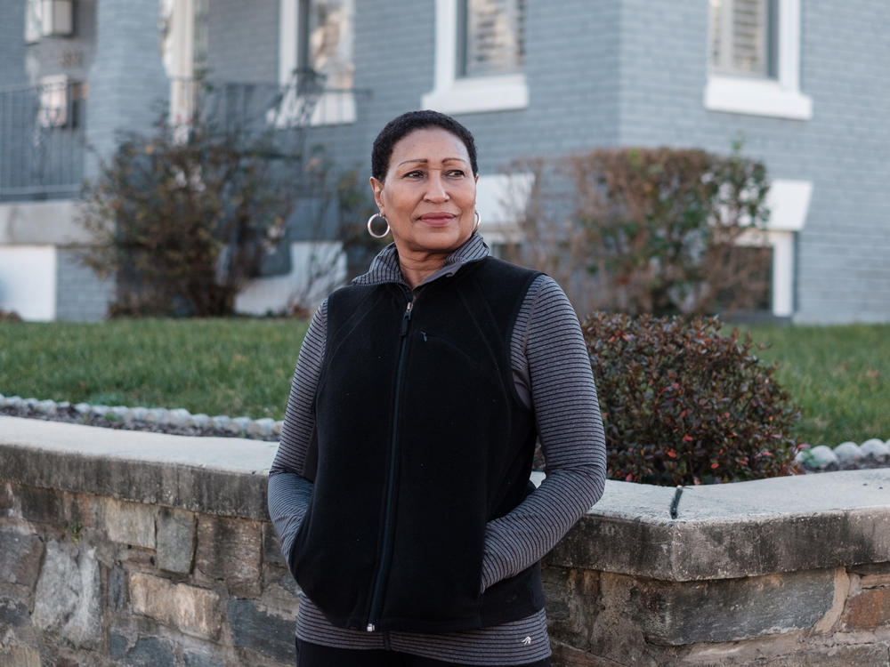 Cynthia Harris outside her home in the Petworth neighborhood of Washington, D.C.