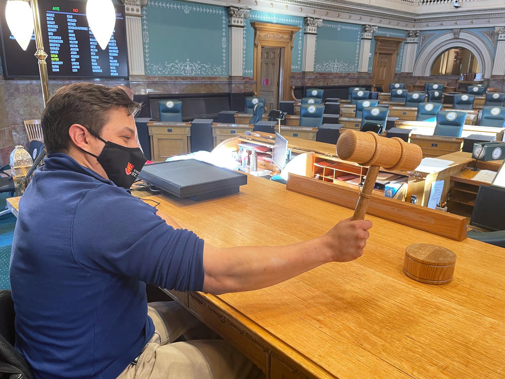 After serving a year in the state House as Colorado's first lawmaker to use a wheelchair, Democratic Rep. David Ortiz uses the new House chamber lift to get to the podium and slam the gavel for the very first time.