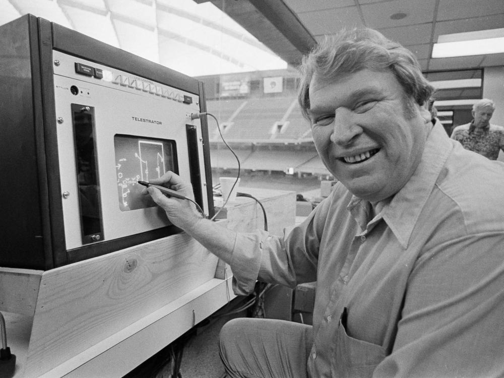 Former Oakland Raiders coach John Madden practices the electronic charting device telestrator on Jan. 21, 1982, for the Super Bowl broadcast on CBS. Madden, the Hall of Fame coach turned broadcaster, died Tuesday morning.