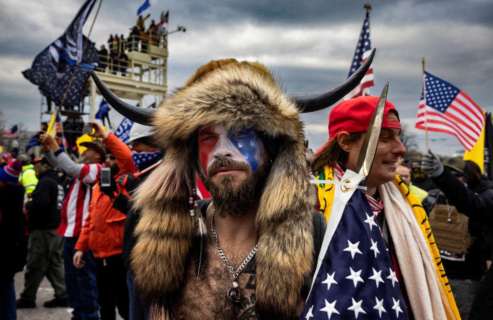 Jacob Anthony Angeli Chansley, known as the QAnon Shaman, is seen at the Capitol riots. Gonell says what he witnessed as he guarded the west entrance to the Capitol was like a 