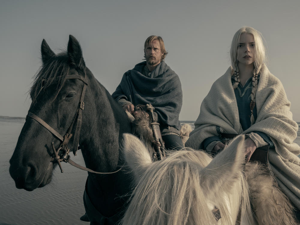 Alexander SkarsgÃ¥rd stars as Amleth and Anya Taylor-Joy as Olga in director Robert Eggers' Viking epic <em>The Northman</em>.