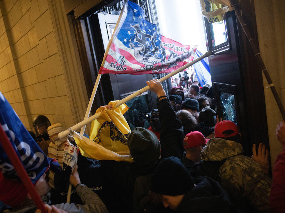A pro-Trump mob breaks into the U.S. Capitol on Jan. 6, 2021, as Congress held a joint session to ratify President-elect Joe Biden's 306-232 Electoral College win over President Donald Trump.