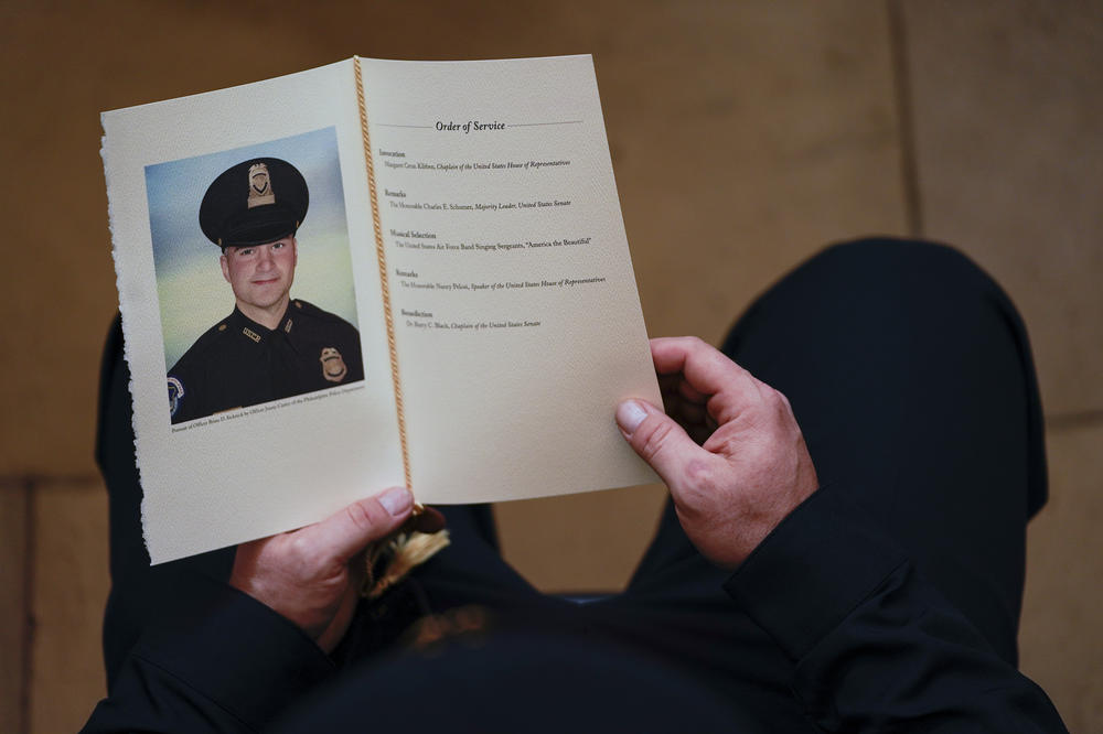 A program for the ceremony memorializing Capitol Police officer Brian Sicknick in Washington, D.C., February 2021.