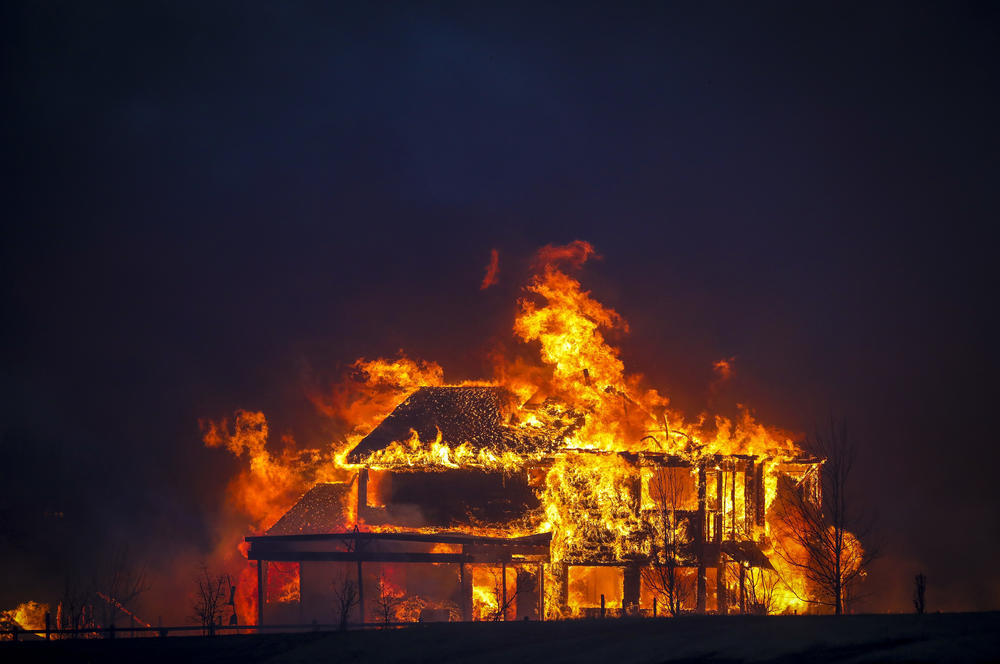 Dec. 30: Louisville, Colo. — A home burns after a fast moving wildfire swept through the area in the Centennial Heights neighborhood.