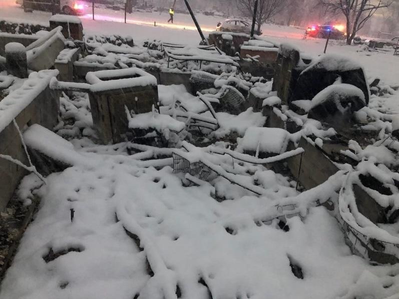 The remains of Taylor Korn's home in Louisville, Colo. She lost her parents' ashes, irreplaceable family photos, her birth certificate and more. She also lost two puppies who were trapped at home during the fire.