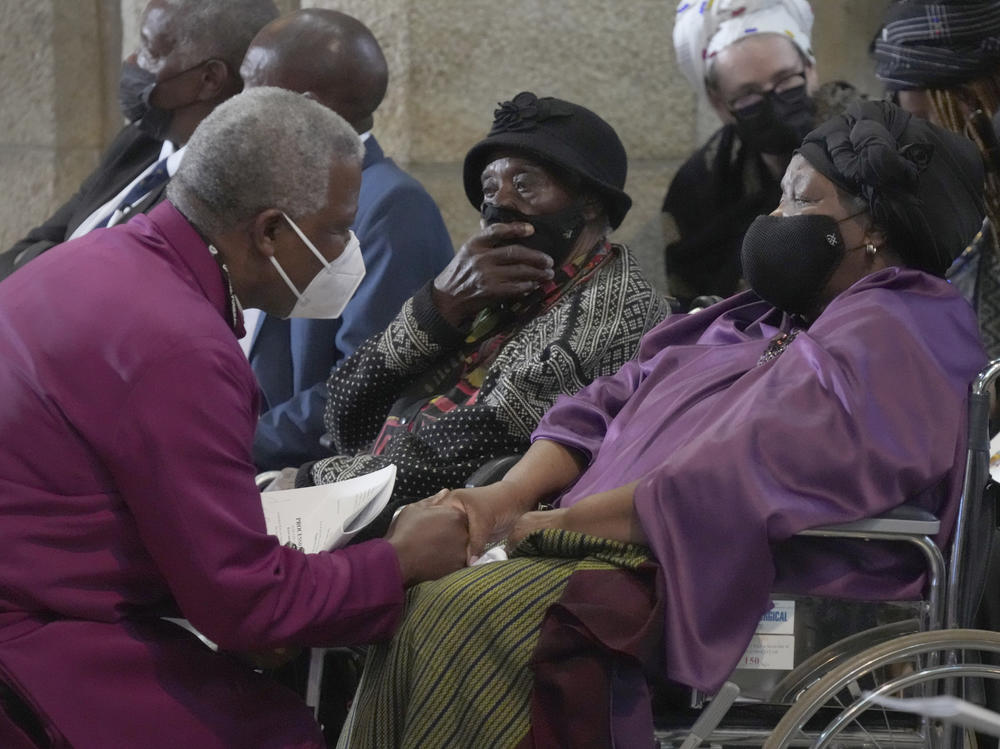 Anglican Archbishop of Cape Town Thabo Makgoba (left) and Leah Tutu, widow of  Anglican Archbishop Emeritus Desmond Tutu, attend the funeral in St. George's Cathedral.