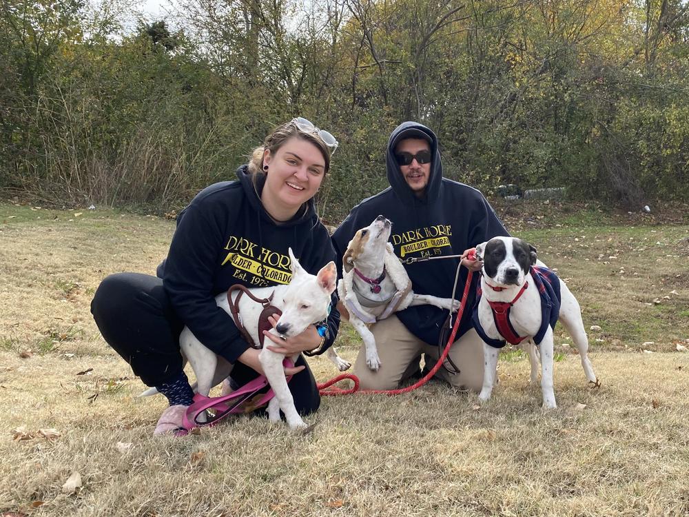 Taylor Korn, and her roommate, Jorge Zaragoza, with their dogs Gerti (left) and Gidget. The third dog is Scarlett, a rescue dog and the mother of the other two pups, belongs to Korn's friends and was elsewhere during the fire.