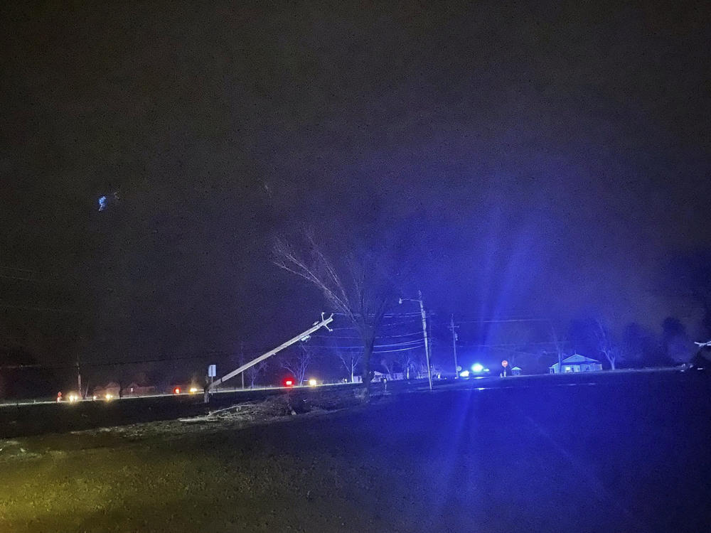 Authorities closed a road after power lines came down and homes suffered damage early Sunday, in Hazel Green, Ala. The storms followed a system earlier Saturday which brought a possible tornado and flooding to parts of Kentucky.