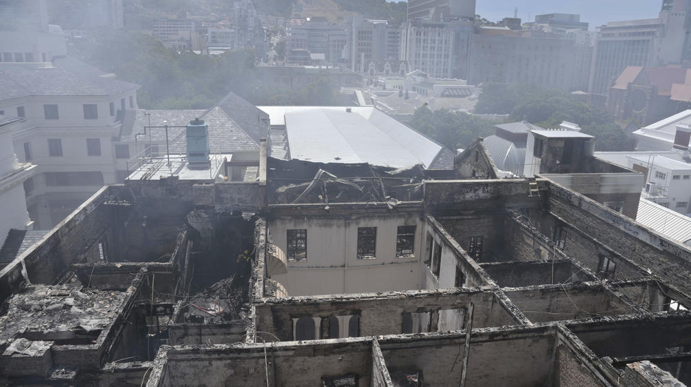 This photo supplied by the City of Cape Town shows the destroyed roof at the Houses of Parliament, in Cape Town, South Africa, on Sunday.