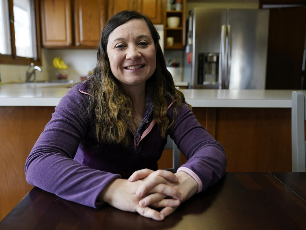 Waukee School District teacher Liz Wagner, seen here in her home in Urbandale, Iowa, said last year she was on the front line of the COVID war. 
