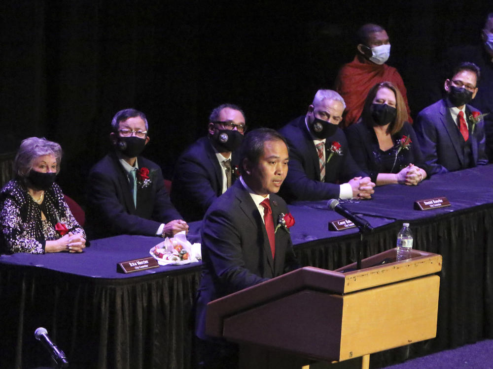 Mayor Sokhary Chau addresses the assembly during the Lowell City Council swearing-in ceremony on Monday in Lowell, Mass.