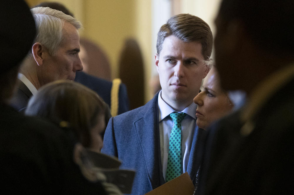 Miles Taylor (center), seen here in March 2019, is among a group of conservatives imploring the 