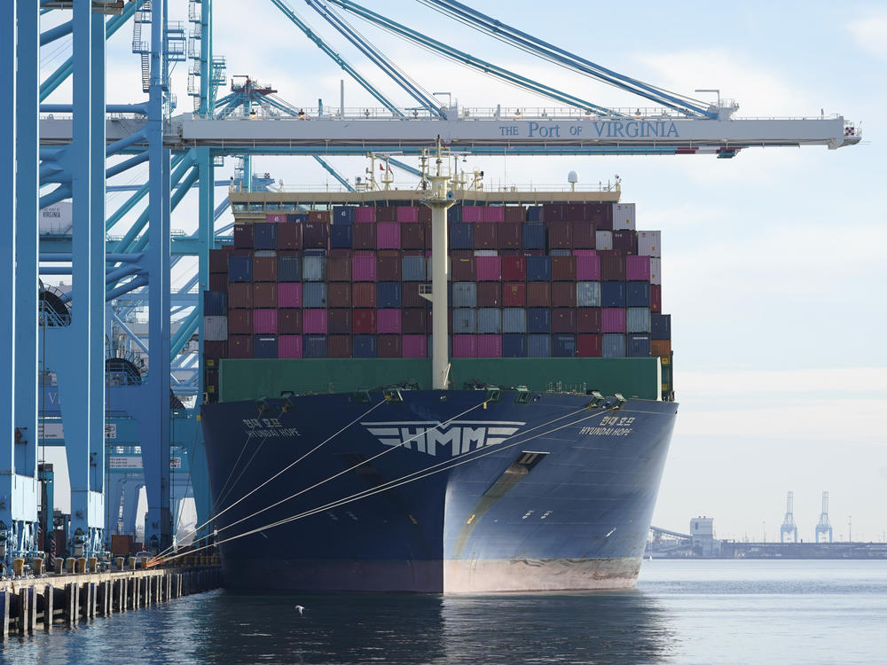 The container ship Hyundai Hope is loaded in Norfolk, Va., on Dec. 1, 2021.