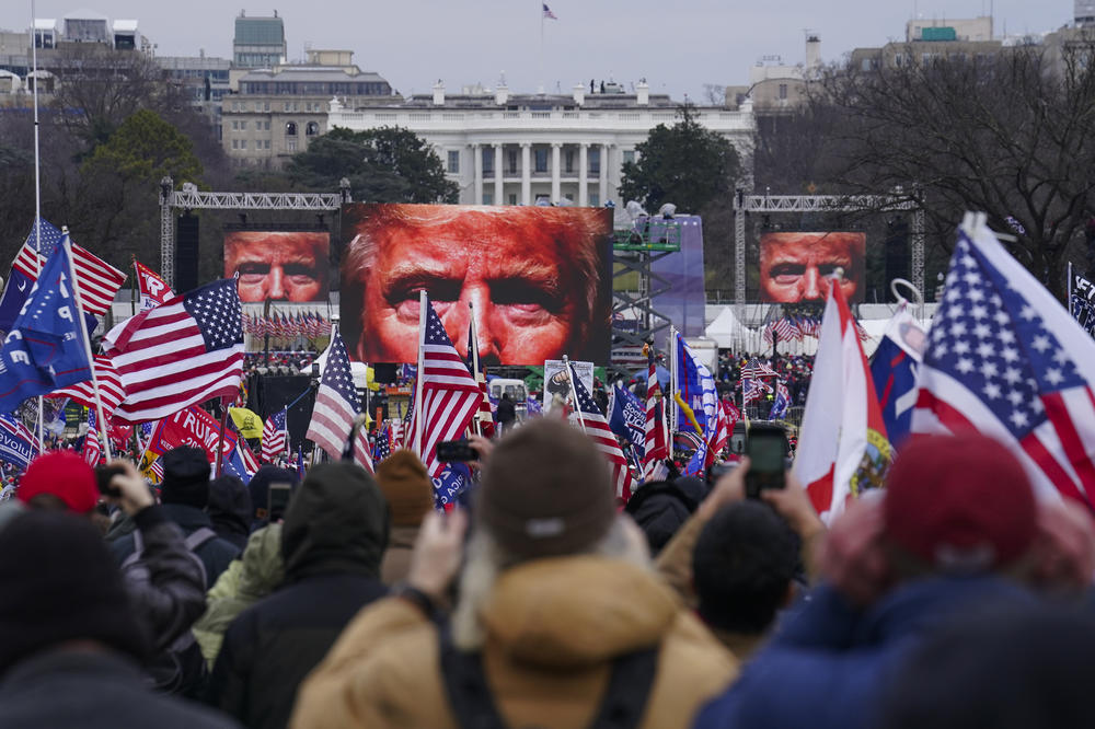 Before the riot, Donald Trump supporters participate in a rally — at which the then-president urged supporters to 