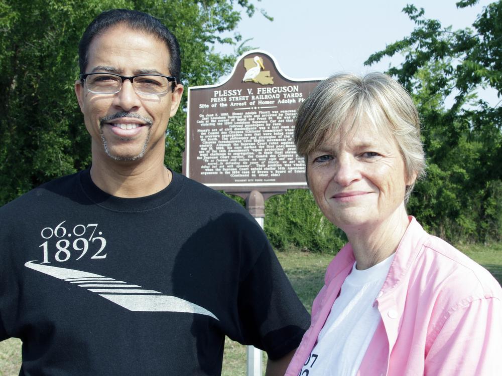 Keith Plessy and Phoebe Ferguson, descendants of the principals in the Plessy V. Ferguson court case, pose for a photograph in front of a historical marker in New Orleans, on Tuesday, June 7, 2011. Homer Plessy, the namesake of the U.S. Supreme Court's 1896 