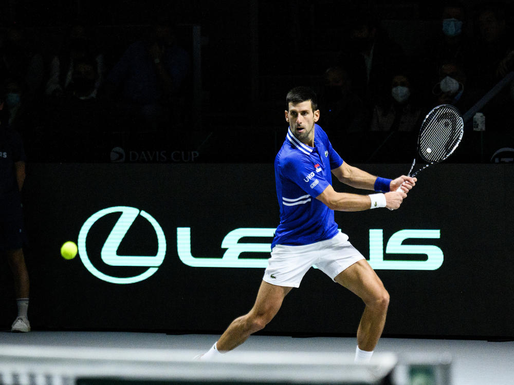 Novak Djokovic of Serbia plays a backhand against Marin Cilic of Croatia during the Davis Cup Semi Final match between Croatia and Serbia at Madrid Arena pavilion in December in Madrid, Spain.