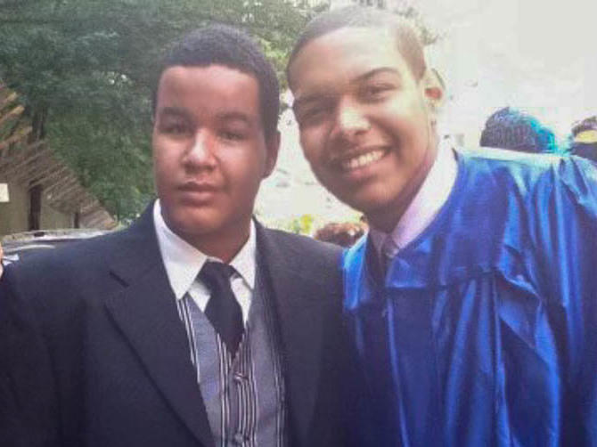 Left to right: Angel Gonzalez and Luis Paulino are seen at Paulino's 2011 high school graduation in New York.