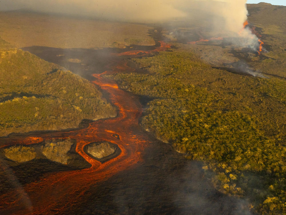 This photo released by the the National Galapagos Park communications office shows lava from the eruption of Wolf Volcano on Isabela Island, Galapagos Islands, Ecuador, on Friday.