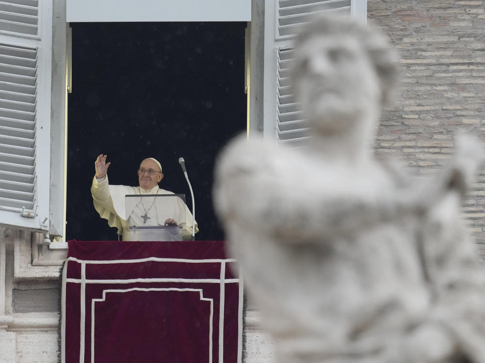 Pope Francis delivers the Angelus noon prayer in St.Peter's Square, at the Vatican on Sunday.