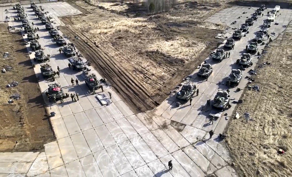 This photo taken from video distributed by Russian Defense Ministry Press Service shows Russian military vehicles move during drills in Crimea, April 22, 2021.