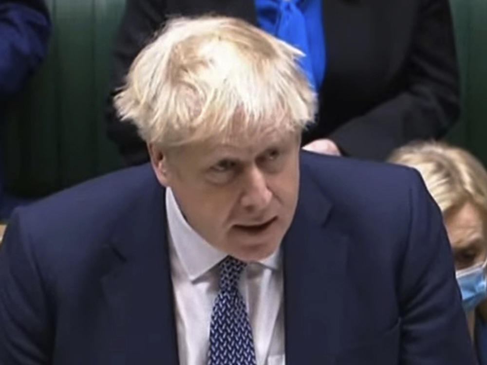In this grab taken from video, Britain's Prime Minister Boris Johnson makes a statement ahead of Prime Minister's Questions in the House of Commons, London, Wednesday, Jan. 12, 2022.