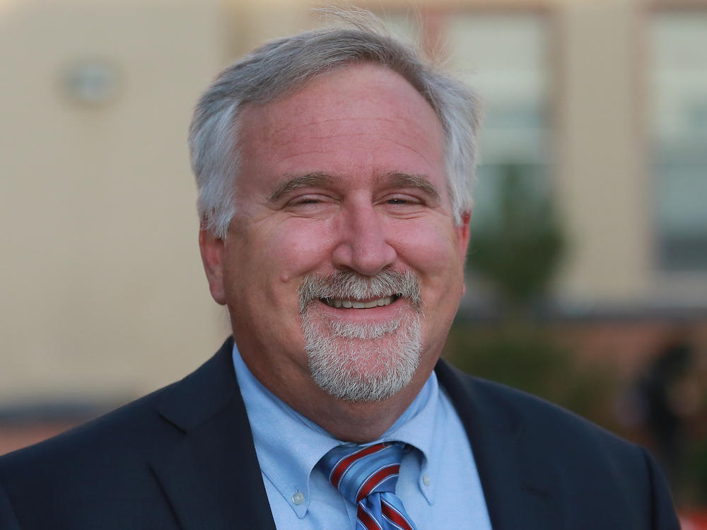 Albuquerque Public Schools superintendent Scott Elder poses outside of Highland High School. Albuquerque Public Schools says classes will be canceled Friday for a second day after a cyberattack.