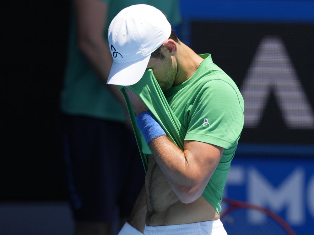 Defending men's champion Novak Djokovic practices at Margaret Court Arena ahead of the Australian Open tennis championship in Melbourne, Australia, on Jan. 13, 2022.