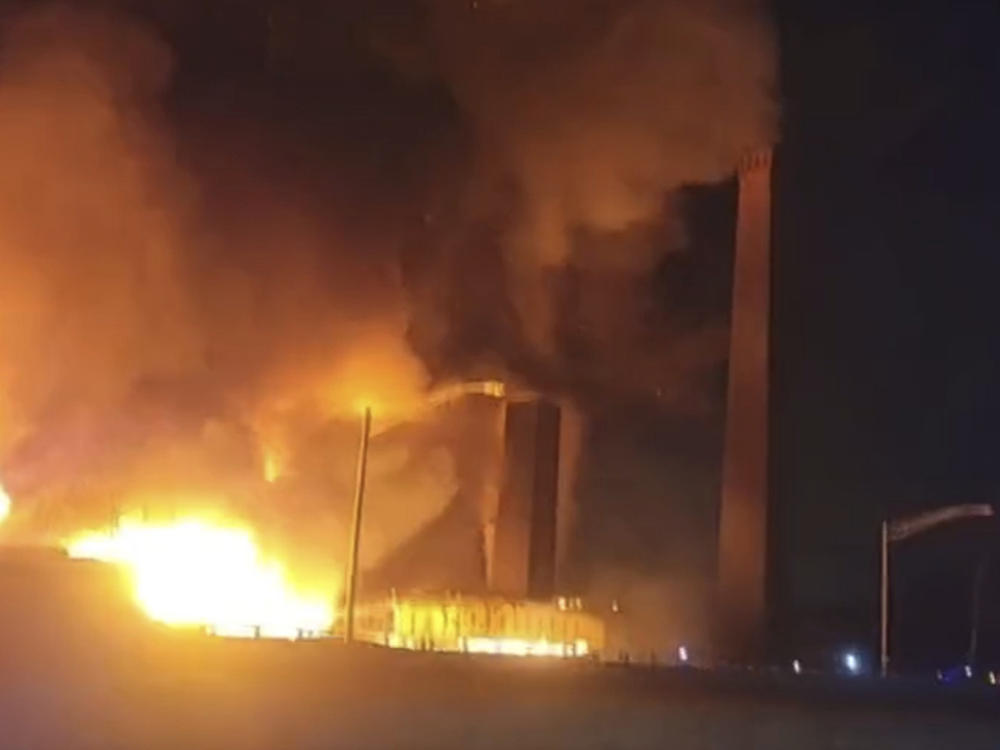 This image from video provided by Mikey B shows a fire near a New Jersey chemical plant, Friday, Jan. 14, 2022 in Passaic, N.J.