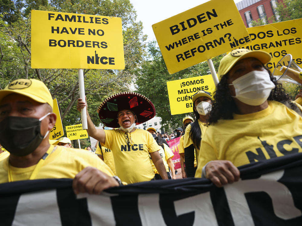 Immigration activists rally near the White House on Oct. 7, 2021. The group demonstrated for immigration reform and urged President Biden to authorize a pathway to citizenship for undocumented immigrants.