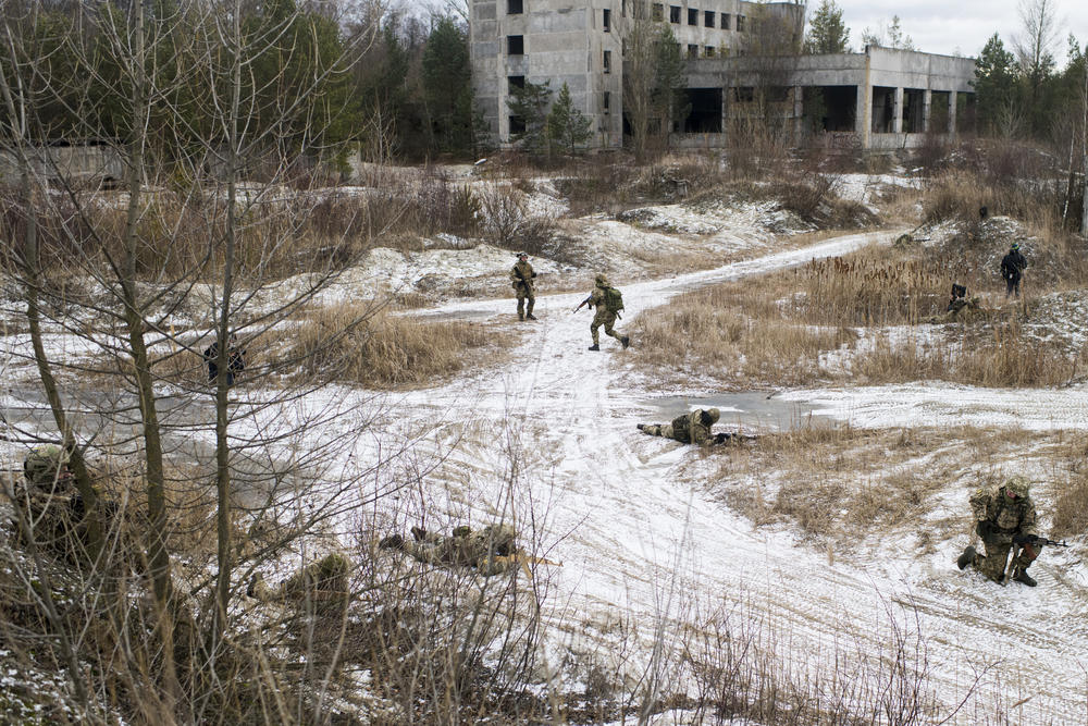 Members of the Territorial Defense Forces take part in training on the outskirts of Kyiv, Ukraine.