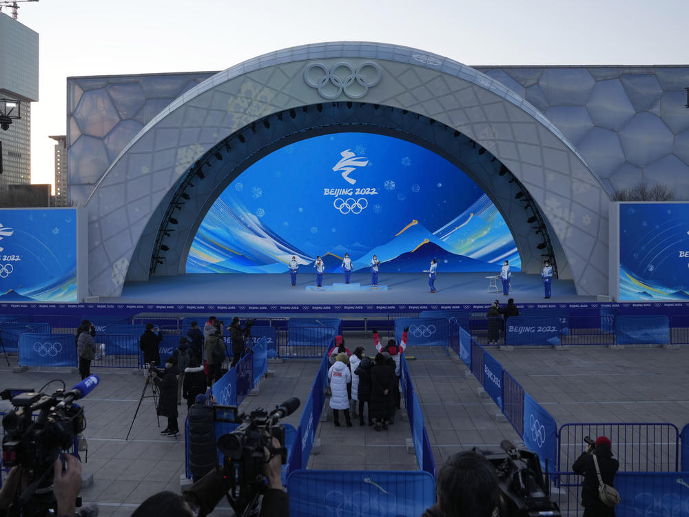 Staff members rehearse a victory ceremony at the Beijing Medals Plaza last week. The venue will host some medal ceremonies at the upcoming winter Olympics.