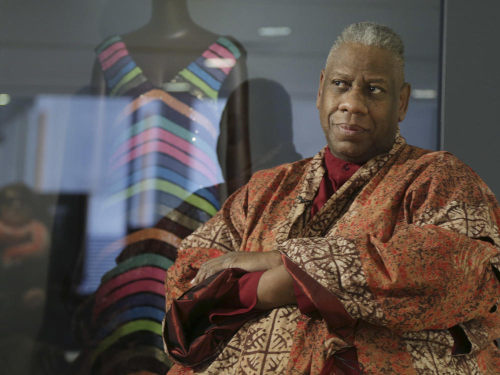André Leon Talley, a former editor at large for Vogue magazine, speaks to a reporter at the opening of the 