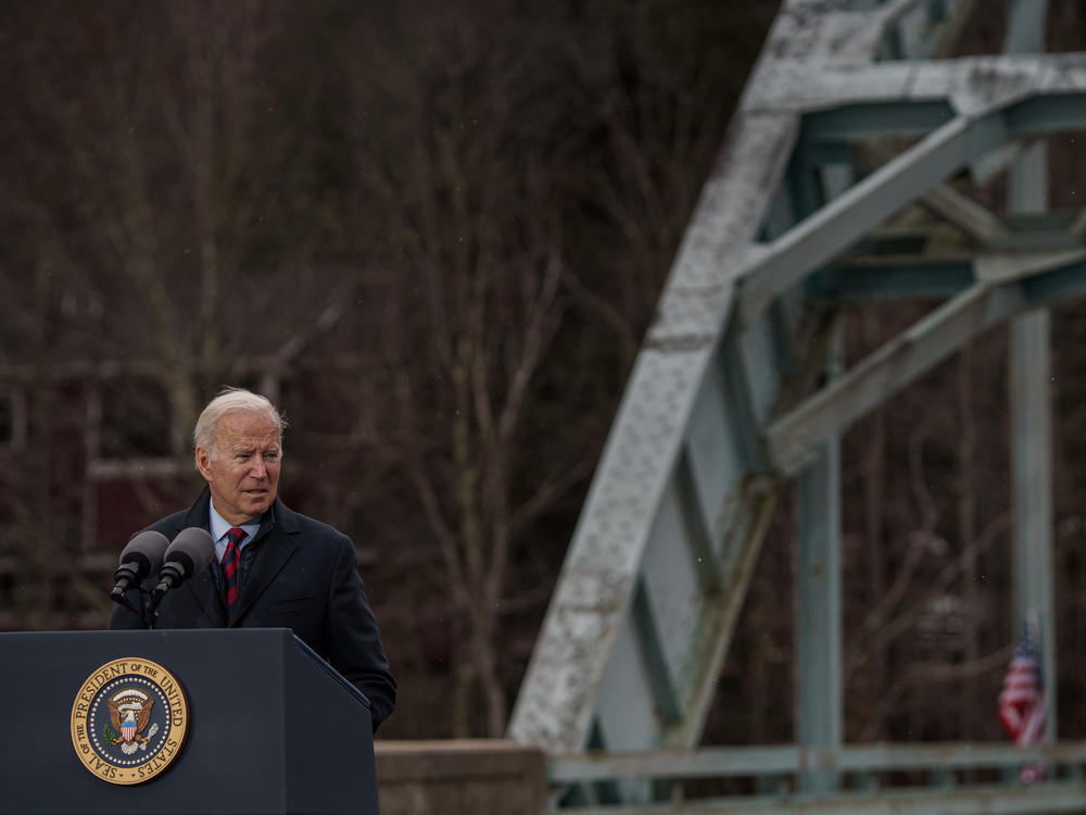 President Biden talks about the infrastructure spending package at an aging bridge spanning the Pemigewasset River in Woodstock, N.H., in November.