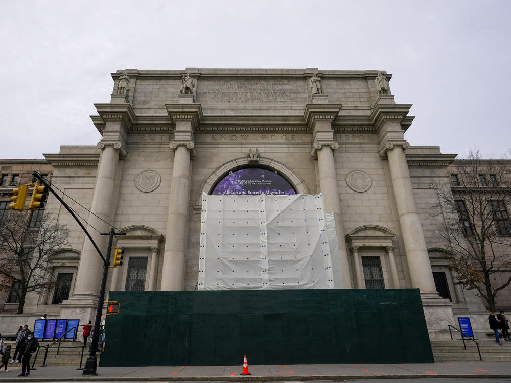 Scaffolding and tarp surround the remnants of the Equestrian Statue of former President Theodore Roosevelt at the entrance to the American Museum of Natural History in New York City on Wednesday.