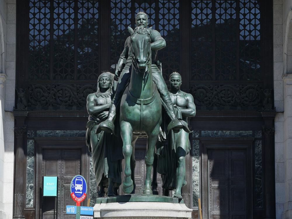 The Theodore Roosevelt Equestrian Statue is shown in front of the American Museum of Natural History's Central Park West entrance in New York City in 2020. Removal began this week.