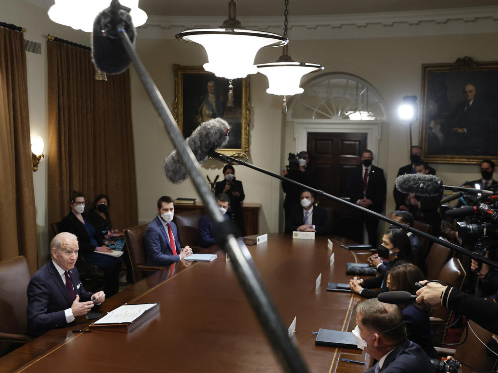 President Biden planned to talk about infrastructure on the anniversary of his inauguration. But first, he had to clean up some comments he had made about Russia and Ukraine.