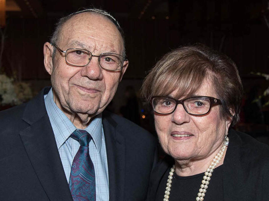 Philip and Ruth Lazowski, both Holocaust survivors, married over a decade after Ruth's mother saved him from a massacre, Philip said.