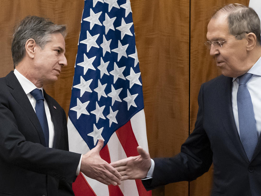 U.S. Secretary of State Antony Blinken greets Russian Foreign Minister Sergey Lavrov before their meeting on Friday in Geneva.