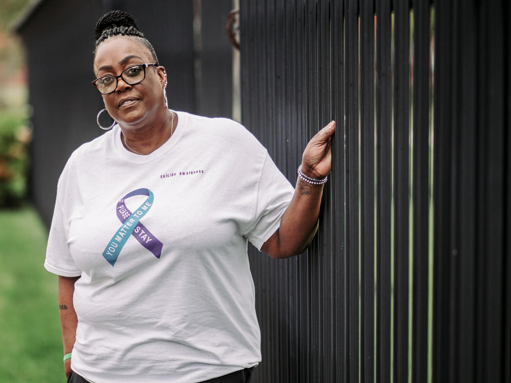Reba Rice-Portwood outside of her home in St. Louis. Rice-Portwood became an advocate for mental health issues after her son died by suicide seven years ago.