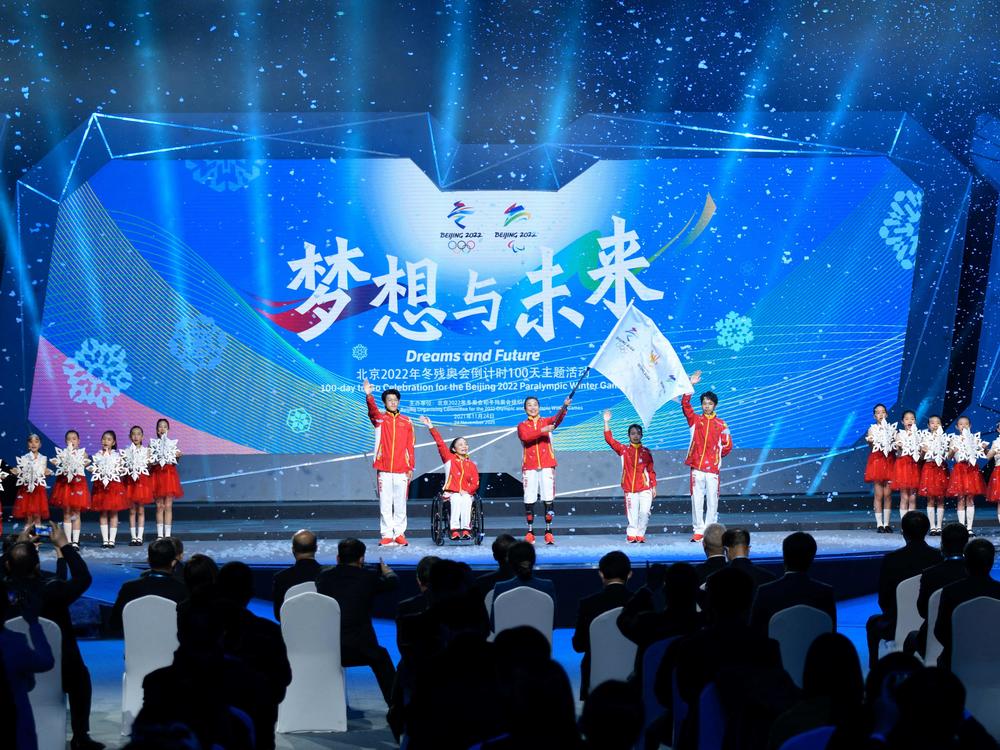 People attend the Beijing 2022 Paralympic Winter Games 100 Day countdown event at the National Aquatic Center in Beijing, China, on Nov. 24, 2021.