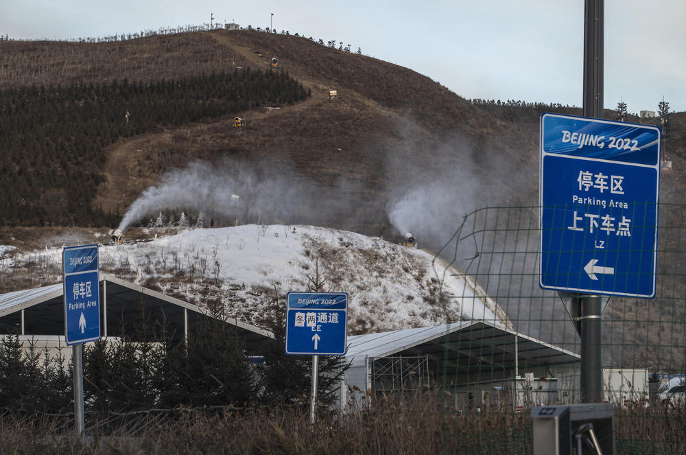 Snow machines make artificial snow near the ski jumping venue for the Beijing 2022 Winter Olympics before the area closed to visitors, on Jan. 2, in Chongli county, Zhangjiakou, Hebei province, northern China. The area will host ski and snowboard events during the Winter Olympics and Paralympics.