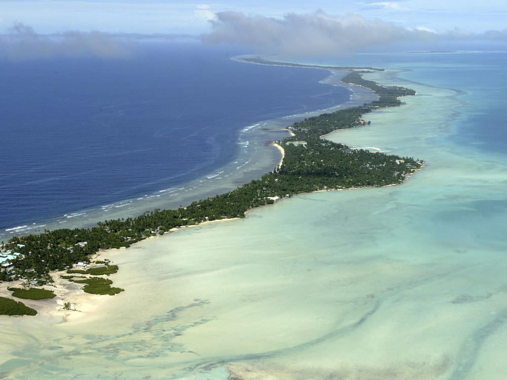 Tarawa atoll, Kiribati, is pictured in 2004. The Pacific island nations of Kiribati and Samoa have announced rare COVID-19 lockdowns after dozens of international travelers tested positive for the virus.