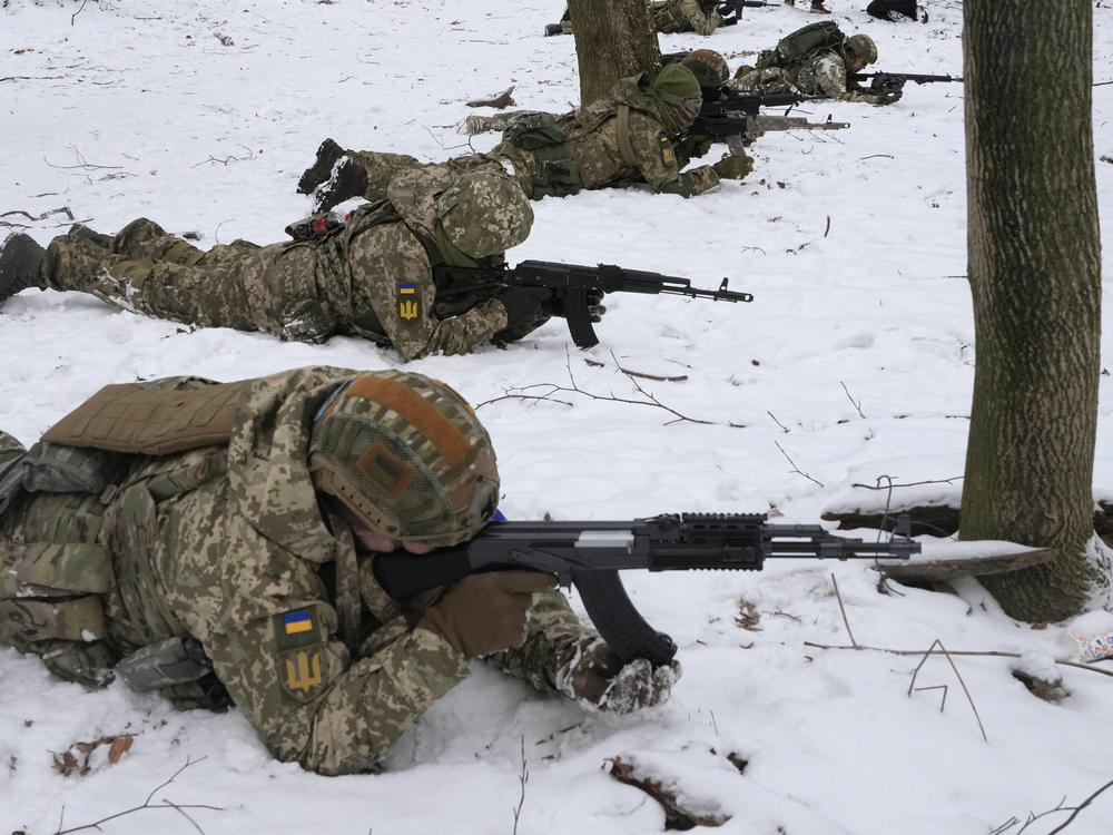 Members of Ukraine's Territorial Defense Forces, volunteer military units of the armed forces, train in a city park in Kyiv. Tensions remain high between Ukraine and Russia as the United States and its NATO allies have tried to intervene diplomatically.