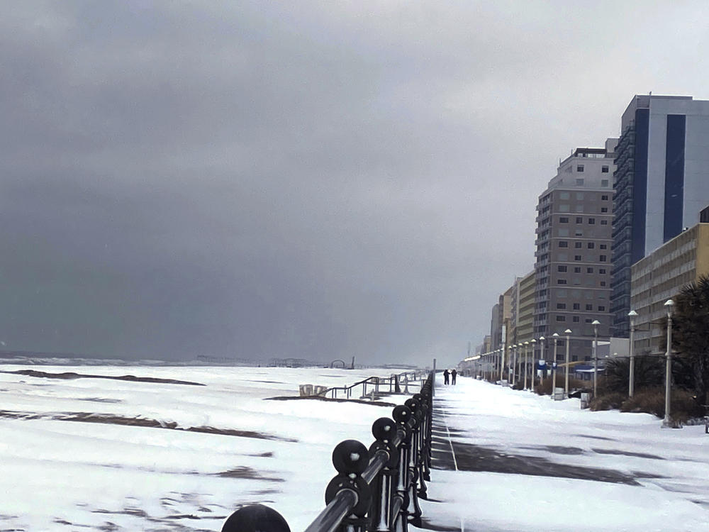 Snow covers the Virginia Beach, Va., oceanfront on Saturday.